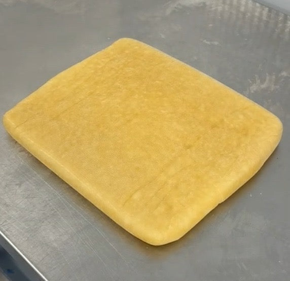 PRESSED INTO BLOCKS